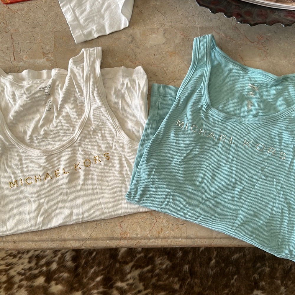 Micheal Kora tank tops
